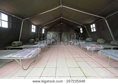 Tent Shelter With Temporary Beds Ready For Disaster Refuges