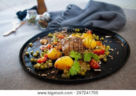 Beef meat stewed with potatoes-Traditional French cuisine Beef Bourguignon potatoes carrots in persillade