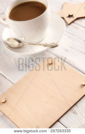 White Cup Of Coffee And Wooden Board For Writing Text. Flatlay.