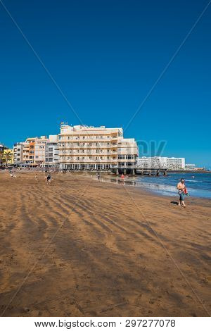 El Medano, Spain - April 11, 2018: Tourist Relaxing In El Medano Beach, Tenerife, Canary Islands, Sp