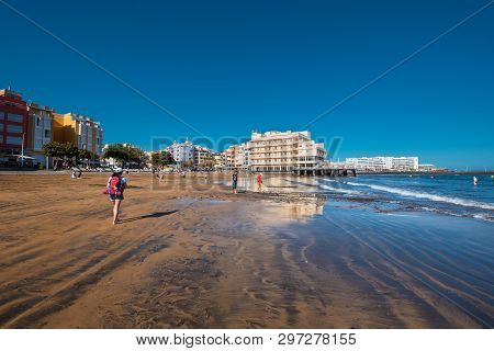 El Medano, Spain - April 11, 2018: Tourist Relaxing In El Medano Beach, Tenerife, Canary Islands, Sp
