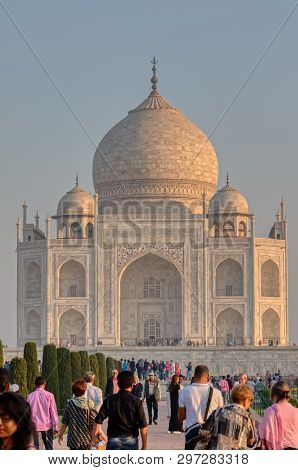 Agra, India - March 5 2018: Tourists Sighteseeing, Exploring And Admiring Famous The Taj Mahal
