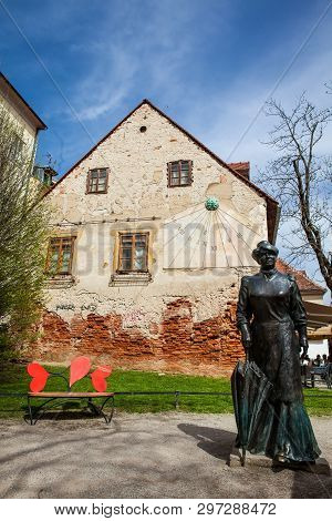 Zagreb, Croatia - April, 2018: Statue Of Famous Writer Marija Juric Zagorka And Sun Clock In Zagreb