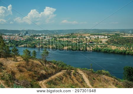 Valley With The Wide Tejo River And Hills Covered By Undergrowth And Industry On Horizon, Near Caste