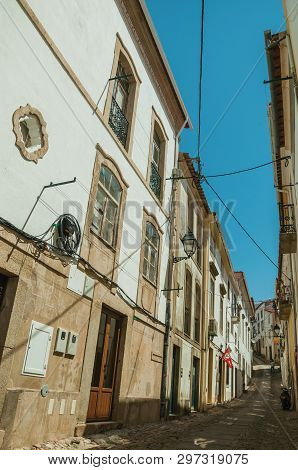 Castelo De Vide, Portugal - July 10, 2018. Old Terraced Houses In A Cobblestone Alley On Slope At Ca