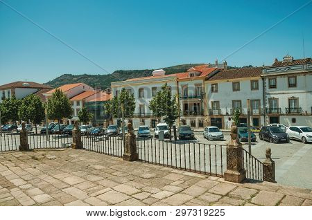 Castelo De Vide, Portugal - July 10, 2018. Old Houses In A Deserted Square With Cars, On Sunny Day A
