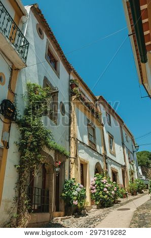 Castelo De Vide, Portugal - July 10, 2018. Old Colorful Houses In Alley On Slope At Castelo De Vide.