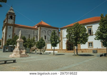 Castelo De Vide, Portugal - July 10, 2018. Houses And Steeple In Baroque Style On Square With Statue