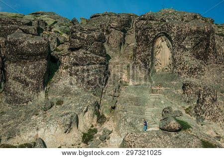 Serra Da Estrela, Portugal - July 12, 2018. Image Of Our Lady Of The Good Star Carved In Cliff And M