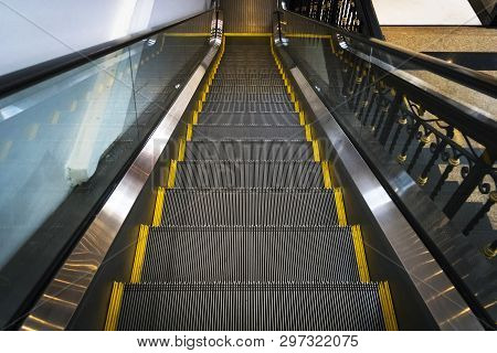 Image Of Escalator Without People. Horizontal Photograph Of The Ladder. Giving The Sensation Of Move