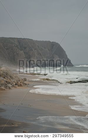 Wonderful Cliff On A Cloudy Day On Big Beach In Colares. Nature, Architecture, History, Street Photo