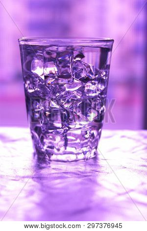 Glass Of Pure Water With Ice Cubes.abstract Dynamic Backdrop For Your Design