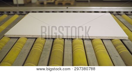 The White Board Of The Eaf Is Traveling Along The Conveyor. The Conveyor Along Which The White Board