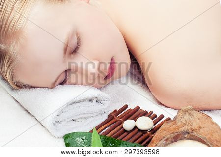 Beautiful Young Woman Getting Spa Massage. Spa Relax Massage And Aromathrapy