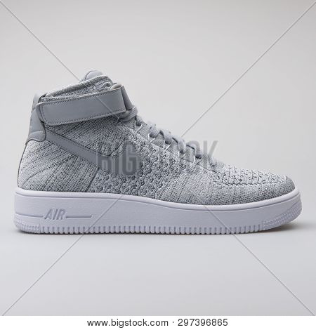 Vienna, Austria - August 7, 2017: Nike Air Force 1 Ultra Flyknit Mid Grey Sneaker On White Backgroun