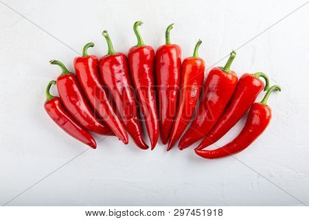 Heap Of Red Pepper On White Background. Top View,  Close-up. Ramiro Pepper. Food Concept.