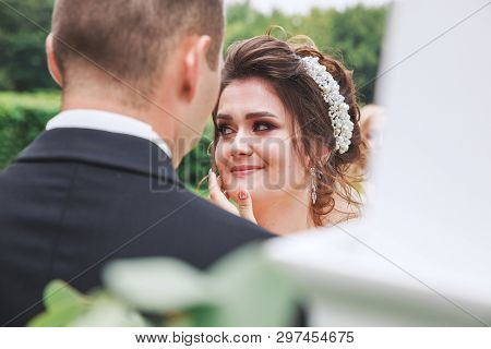 Close-up Of Crying Bride Near Wedding Arch