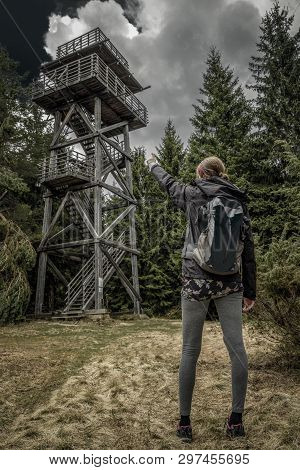 Woman And Lookout On Hill Sunava In Village Velke Borove, Slovakia