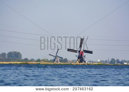 Waterways Of North Holland And View On Traditional Dutch Wind Mill, Spring Landscape