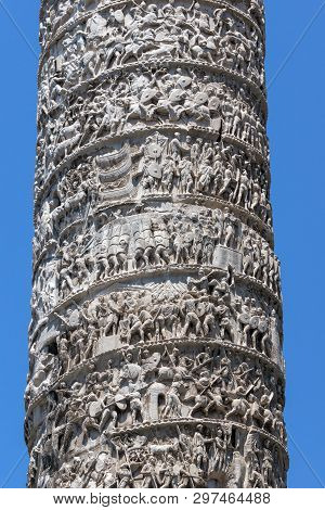 Architectural Detail From Of Ancient Marcus Aurelius Column In Front Of Palazzo Chigi In City Of Rom