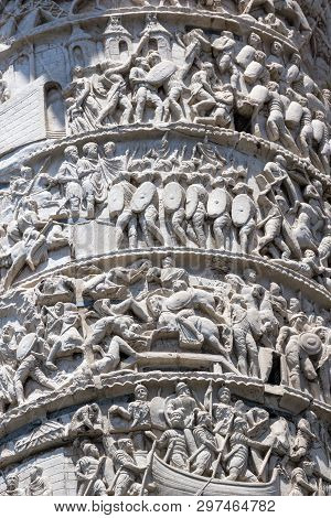 Architectural Detail From Of Ancient Marcus Aurelius Column In Front Of Palazzo Chigi In City Of Rom
