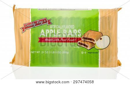 Winneconne, Wi -  19 April 2019: A Package Of Daddy Rasy Apple Bars On An Isolated Background