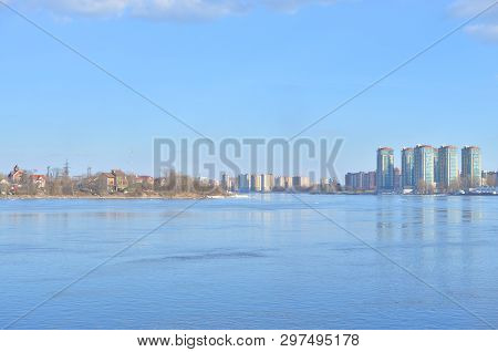 View Of Neva River And Microdistrict Ribatskoe On The Outskirts Of St. Petersburg At Sunny Spring Da