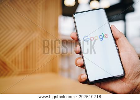 Chiang Mai, Thailand - Mar. 23,2019: Man Holding Xiaomi Mi Mix 3 With Google Search On Screen. Googl