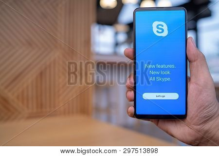 Chiang Mai, Thailand - Mar. 23,2019: Man Holding Xiaomi Mi Mix 3 With Skype Apps. Skype Is Part Of M