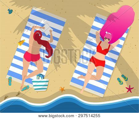 Women On Beach. Couple Of Young Girls In Red Sexy Swimwear Relaxing Lying On Back And Belly On Towel