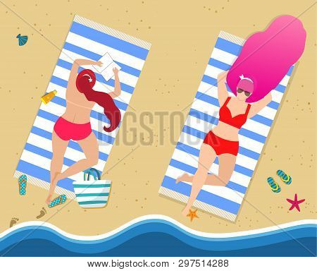 Young Girls In Red Sexy Swimwear Relaxing On Beach. Couple Of Women Lying On Back And Stomach On Tow