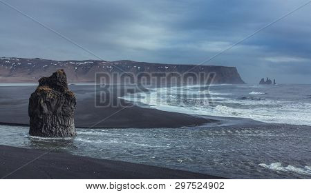 Reynisfjara, Cliffs Of Vik, Iceland - February 22, 2011: Black Sand Beach Reynisfjara In Iceland. Wi