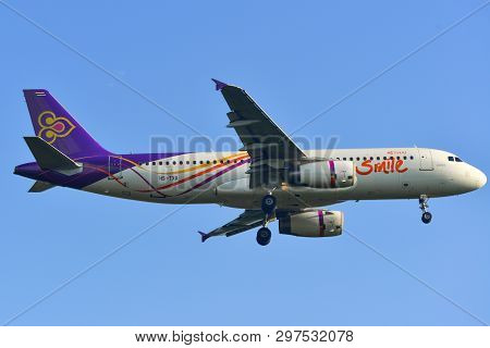 Passenger Airplane Landing At The Airport