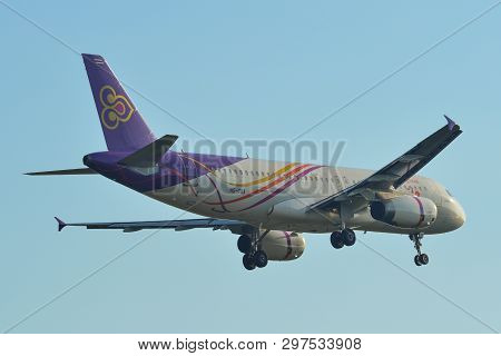 Passenger Airplane Landing At The Airport