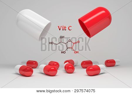 Vitamin C Supplement. Opened Large Pill With Small Capsules On White Background And Chemical Structu