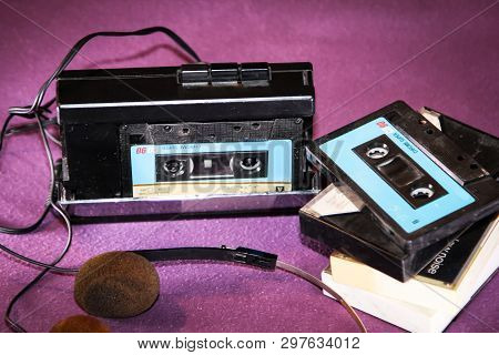 Old Audio Cassette With Walkman And Headphones