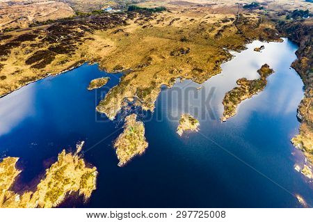 Aerial View Of Lough Doon Between Portnoo And Ardara Which Is Famous For The Medieval Fort - County 