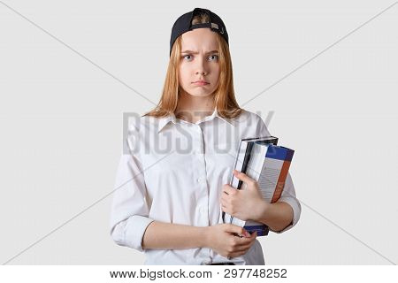 Young Student Has Bad Result Of Exam. Schoolgirl Stands Isolated Over White Background, Girl Studies