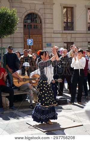 Granada, Spain 10Th March 2019: Flamenco Dancer Dances For Tourists In Plaza Nueva.