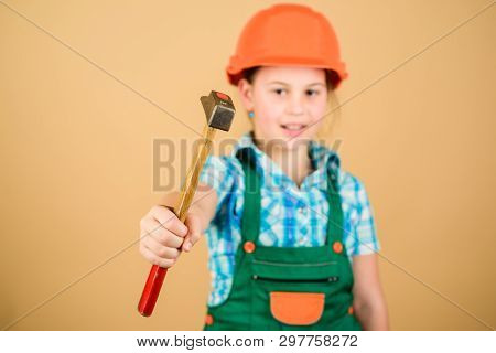 Foreman Inspector. Little Girl In Helmet With Hammer. Kid Worker In Hard Hat. Labor Day. 1 May. Repa