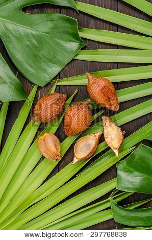 Snake Fruit, Rakum, Sala On Wood Background. Tropical Fruit.