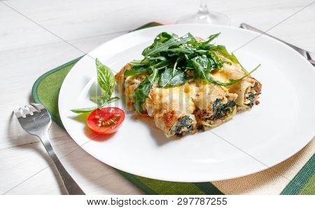 Cannelloni With Spinach, Cheese And Bechamel Sauce.