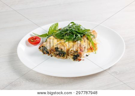 Cannelloni With Spinach, Cheese And Bechamel Sauce.