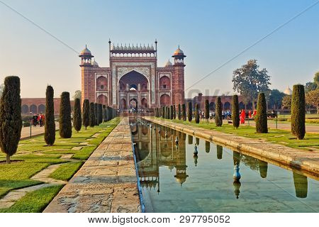 Agra, India - March 5 2018: Tourists Sighteseeing, Exploring And Admiring Famous The Taj Mahal