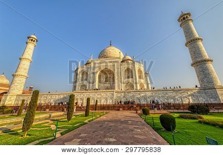 Agra, India - March 5 2018: Wide Lens Shot Of The Famous The Taj Mahal, With Tourists Sighteseeing, 
