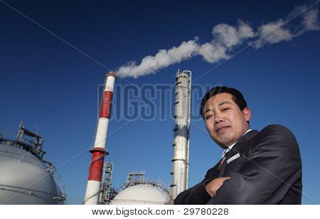 นักธุรกิจ Potret กับพื้นหลังพืช