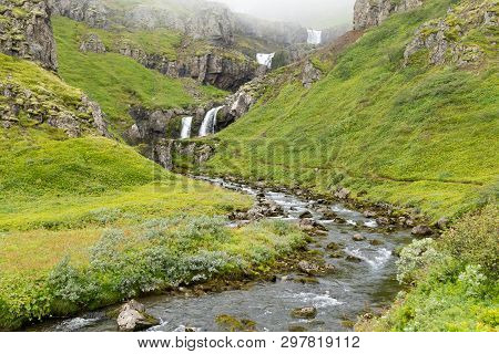 Klifbrekkufossar Falls In Summer Season View, Iceland. Icelandic Landscape.