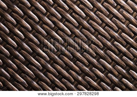 Close-up Dark Brown Background Is An Element Of Wicker Furniture Made Of Polymer Fibers. Synthetic L