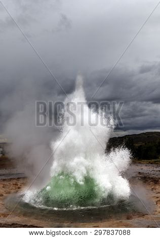The Geyser Strokkur In Iceland At The Moment It Explodes.