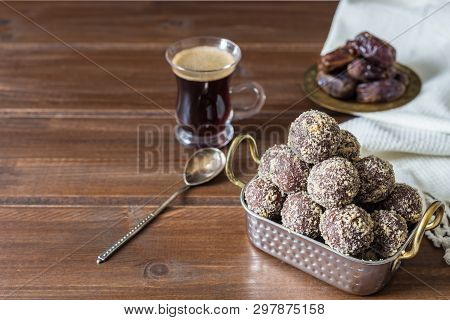 Dates And Oatmeal Energy Balls Or Bites No Cook With Espresso Black Coffee On Wooden Table Healthy F